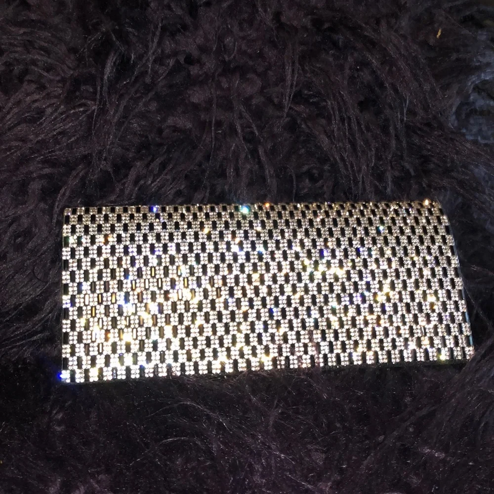 Silver and black clutch purse. - Picture 1 of 3
